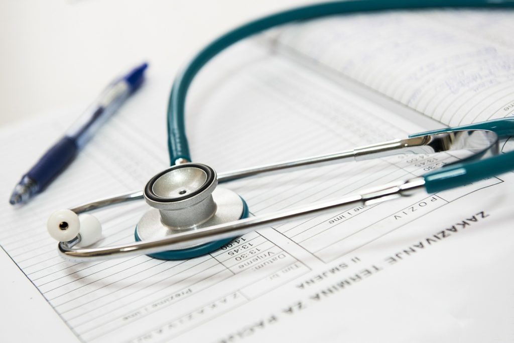 Stethoscope on top medical chart